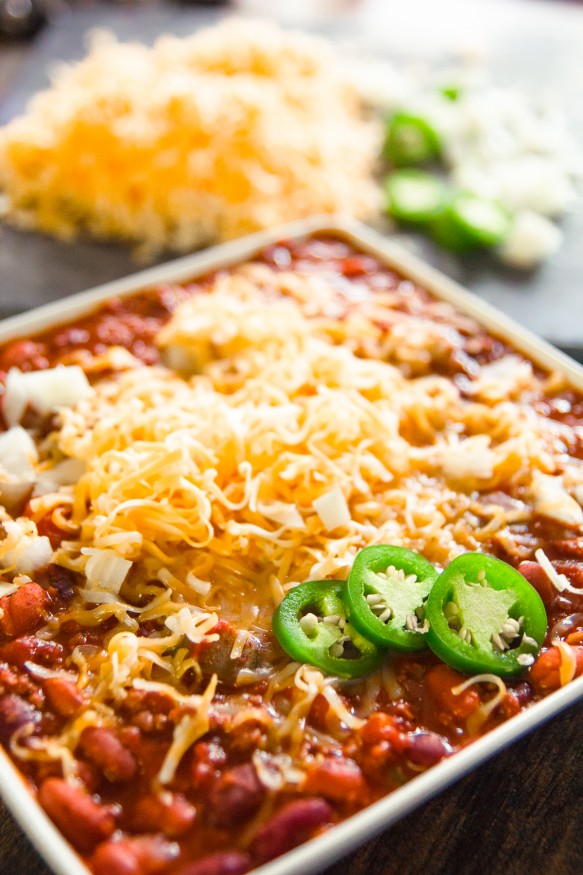 Slow cooked Crock Pot Chili with Ground beef tomatoes, beans and jalapenos and a spicy seasoning, This batch of spicy chili is a great weeknight dinner!