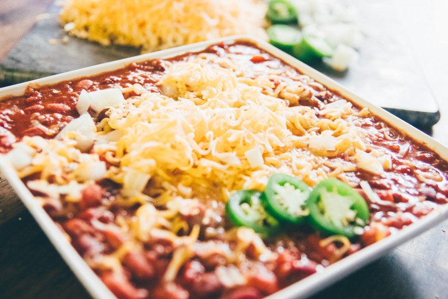 Slow cooked Crock Pot Chili with Ground beef tomatoes, beans and jalapenos and a spicy seasoning, This batch of spicy chili is a great weeknight dinner!