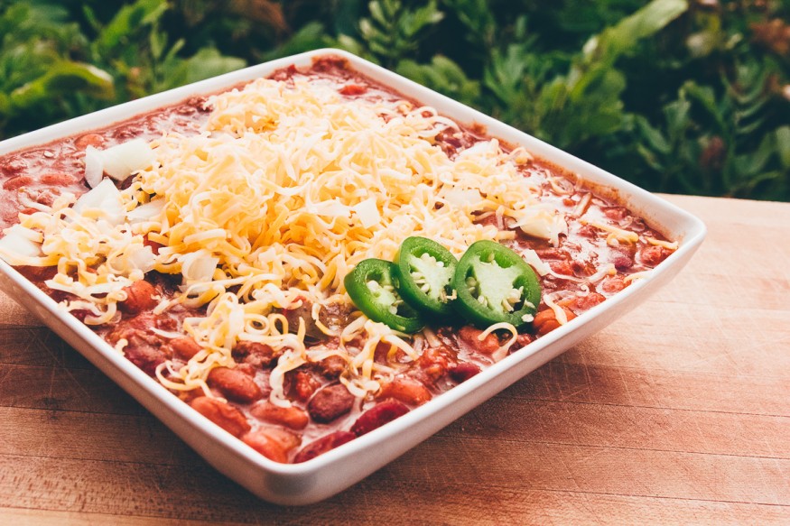 Slow cooked Crock Pot Chili with Ground beef tomatoes, beans and jalapenos and a spicy seasoning, This batch of spicy chili is a great weeknight dinner!