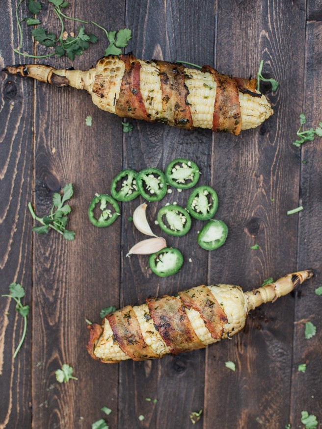 Bacon Wrapped Corn with a Jalapeno and Cilantro blend that will take your summer grilling to the next level! Full of flavor and spiciness! dadwithapan.com