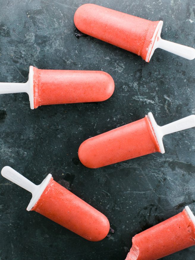 Popsicles with banana ice cream, strawberries, and coconut almond milk. Guiltless and perfect for a hot summer day! 