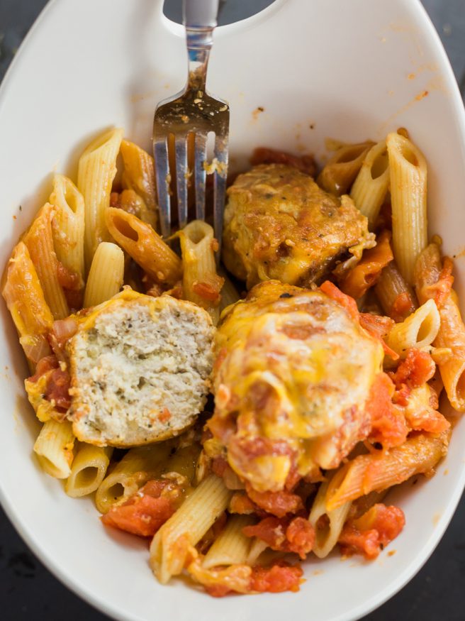 Turkey Meatball recipe with basil, oregano, and breadcrumbs, added into baked ziti. Perfect for Sunday dinner full of flavor and a great beef alternative! 