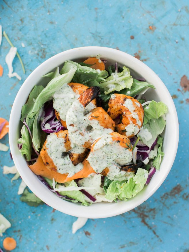 Grilled Margarita shrimp on a Southwestern Crunch Salad mix from Taylor Farms. Topped with a Jalapeno Cilantro Ranch dressing makes a perfect summer dinner!