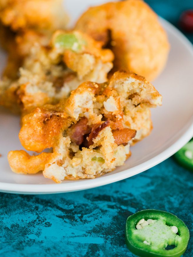 Fried Bacon and Thanksgiving Stuffing Fritters served with a sweet and spicy jalapeno cranberry sauce. Sure to be the hit at your thanksgiving get together!