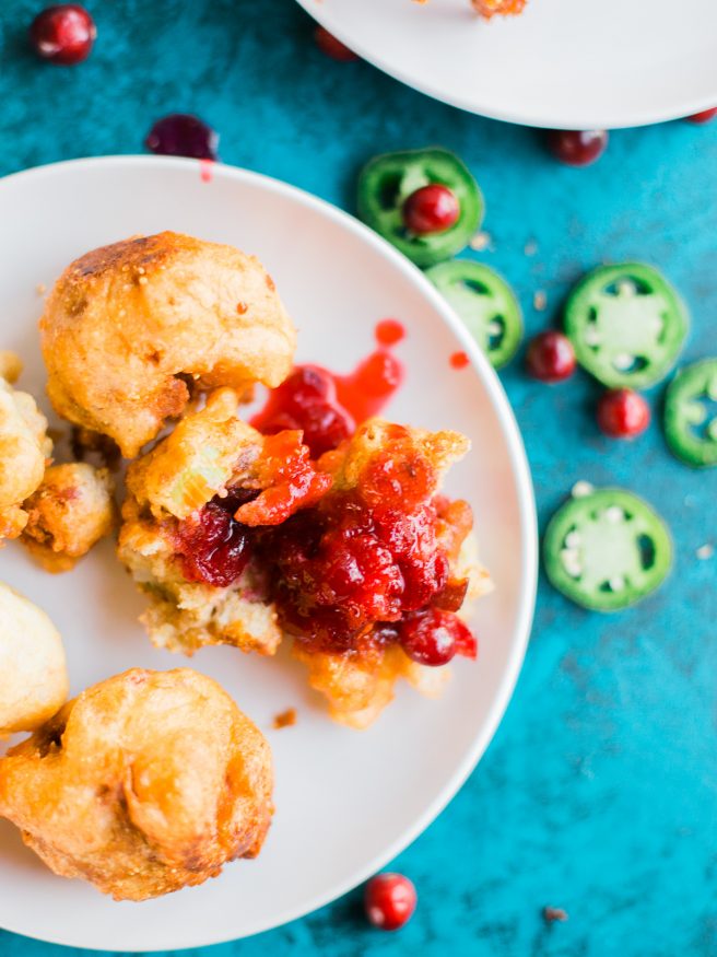 Fried Bacon and Thanksgiving Stuffing Fritters served with a sweet and spicy jalapeno cranberry sauce. Sure to be the hit at your thanksgiving get together!