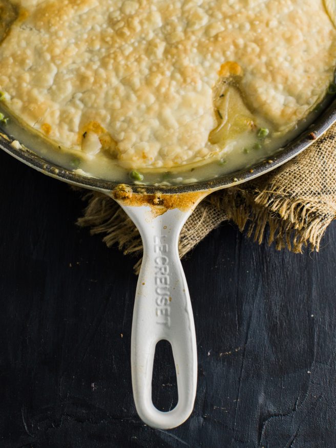 Chicken Pot Pie that's easy to prep. All in one skillet with pre-cooked rotisserie chicken, fresh rosemary, thyme peas and carrots! 