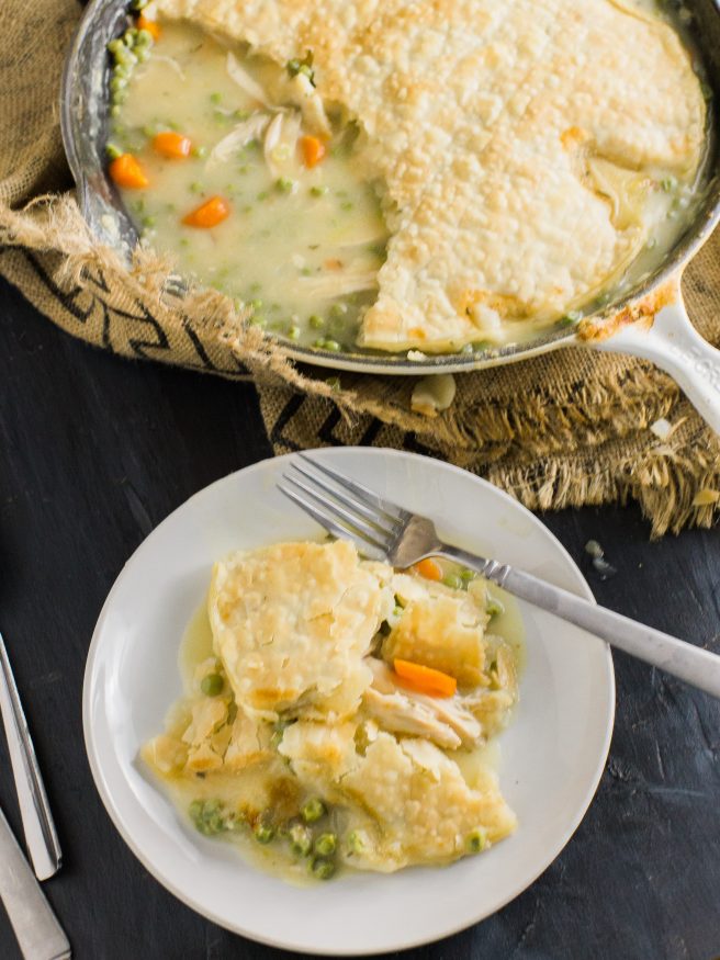 Chicken Pot Pie that's easy to prep. All in one skillet with pre-cooked rotisserie chicken, fresh rosemary, thyme peas and carrots! 