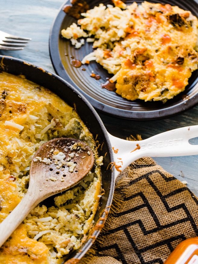 This breakfast skillet is loaded with cheese, bacon, and egg and hash browns. The ultimate casserole to bring to brunch!