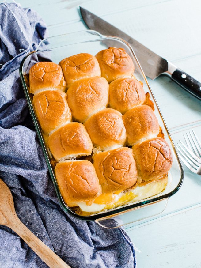 Breakfast Slider Casserole loaded with bacon eggs and cheese with Hawaiian rolls. Easy to serve up for brunch or a nice weekend breakfast with the family!