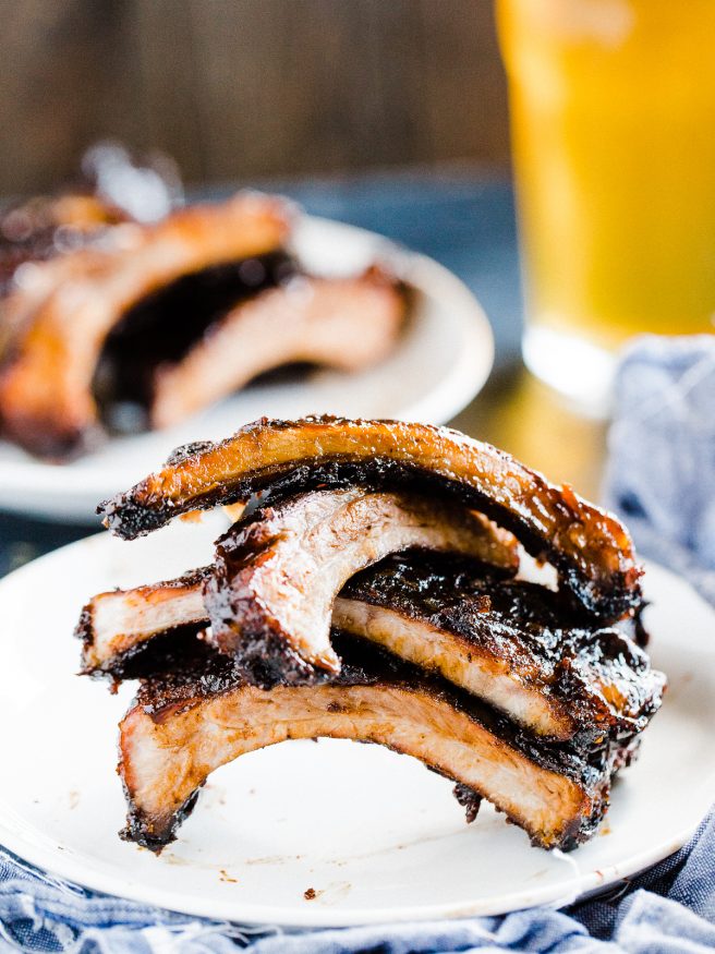 Slow grilled baby back ribs with a sweet and spicy barbecue rub. Grilled with a smoker box full of apple wood chips and super tender and delicious!