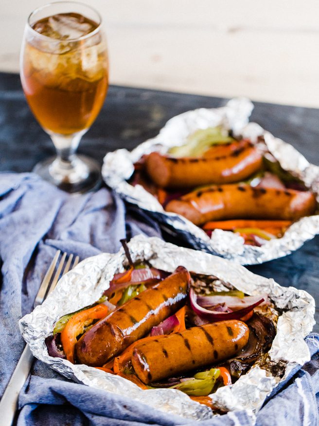 Sausage and Peppers done in foil packs making cooking, prep, and cleanup a breeze. Perfect for summer weeknights!