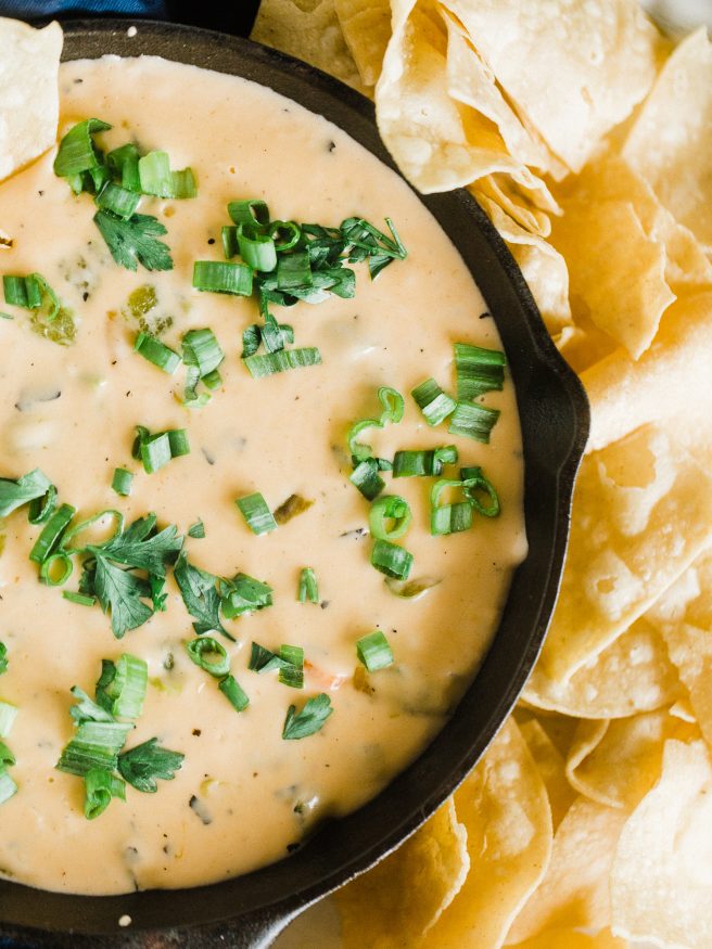 A roasted hatch pepper queso dip loaded with various cheese's and perfect for game day!. Hatch peppers we're meant for queso dip! 