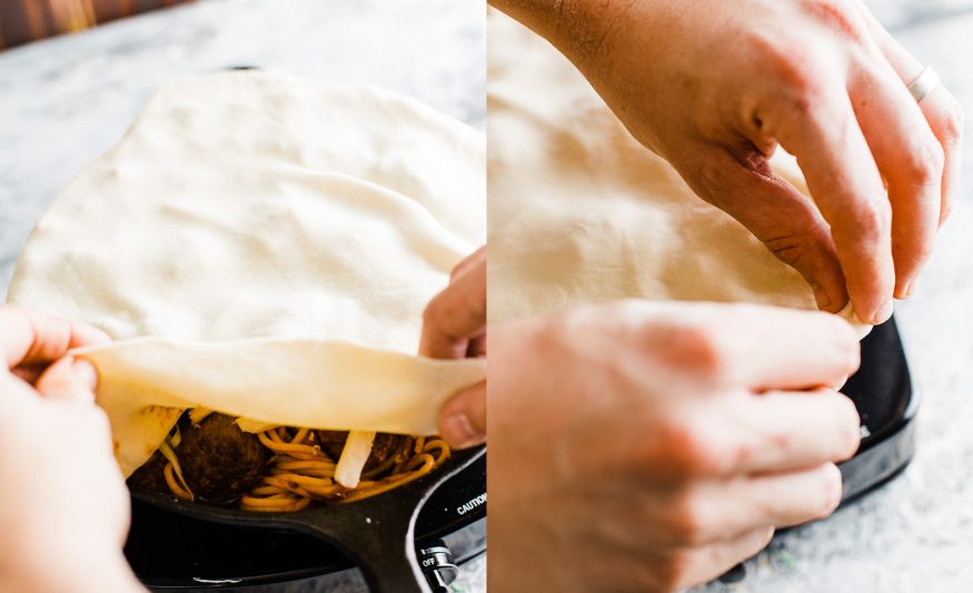 Spaghetti and Meatball Pot Pie is great one pan meal for the weekend. Spaghetti and Meatballs cooked with mozzarella and topped with pizza dough for crust!