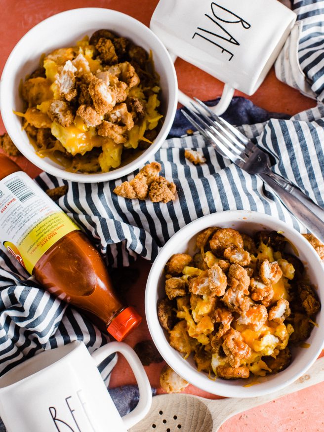 Chicken and Egg in a breakfast bowl?! It surprisingly works and is addictingly delicious! For the last few months we've been eating these Chicken and Scrambled Egg Hash Brown Bowls for breakfast from a breakfast spot near us, but I had to make my own version and share it because I love it that much!