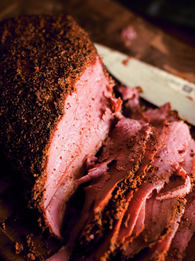 Save a few days of waiting and skip brining your brisket for Smoked Pastrami and use a corned beef packer. Slow smoked, then steamed, making an amazing home-made pastrami!