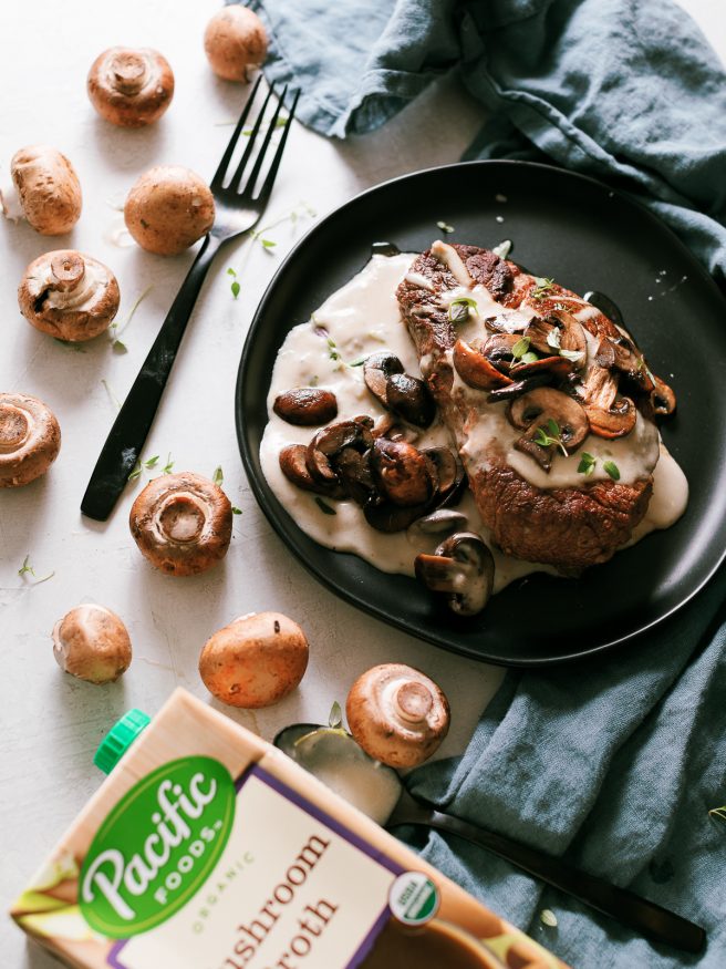 Pan seared filet mignon with a from scratch mushroom cream sauce pour on top. Served with sauteed mushrooms making for an amazing dinner!