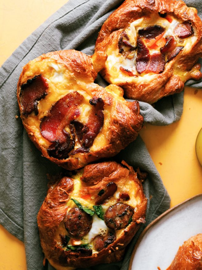 Breakfast Croissant Boats loaded with an egg bacon and bell pepper frittata is soo delicious and the perfect way to get your weekend breakfast going!