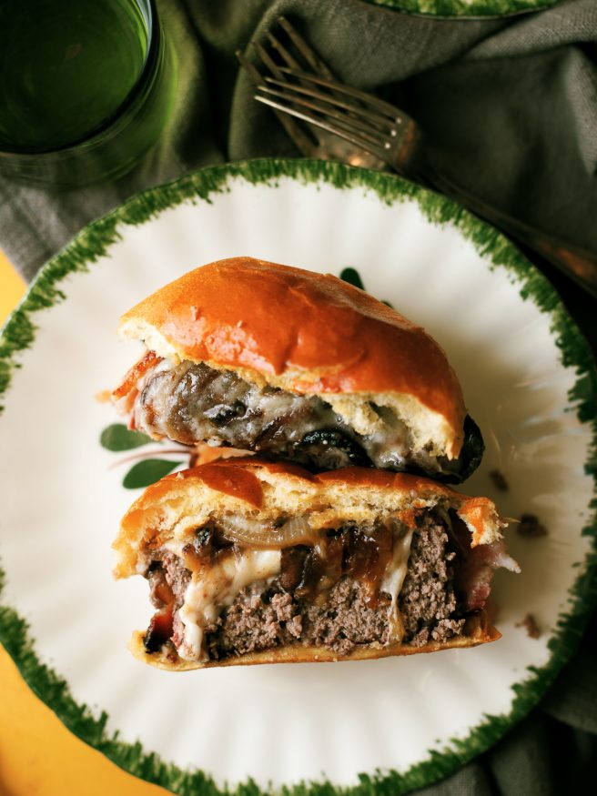 Bacon Wrapped Soda Can Burgers filled with Mac an Cheese for the kids, and grilled onion and mushroom with swiss for the adults! 