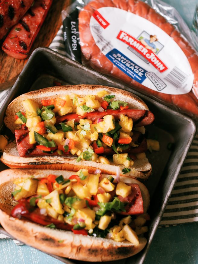 The smokiness from the sausage and bright, beautiful flavors from the pineapple
salsa go together perfectly in this awesome summer grilled sausage hoagie!
