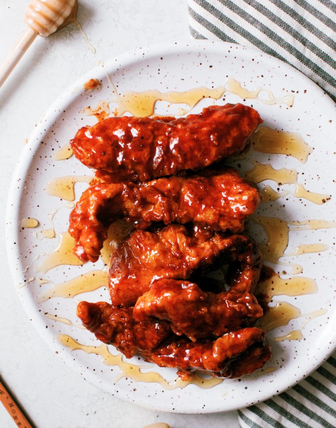 Fried Chicken Tenders made from scratch, then tossed in a spicy and sweet chipotle honey barbecue sauce.