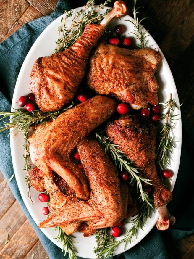 Smoked Turkey legs with a rosemary and sage brine that is perfect for all the dark meat lovers for Thanksgiving and Christmas dinner!