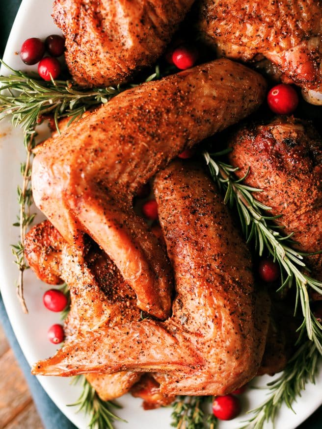 Smoked Turkey legs with a rosemary and sage brine that is perfect for all the dark meat lovers for Thanksgiving and Christmas dinner!