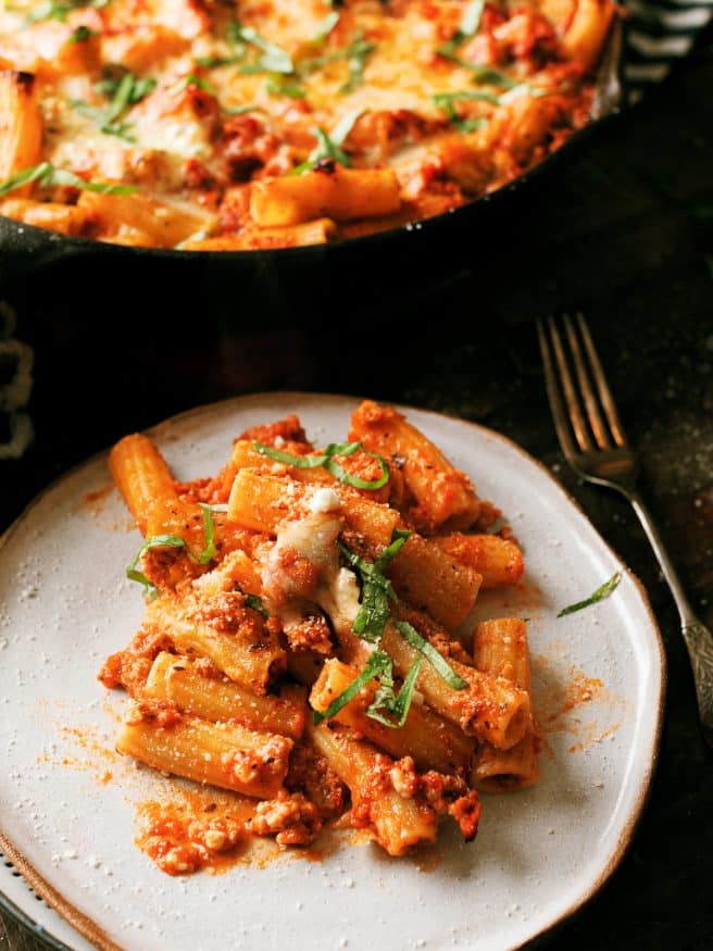 A Lasagna Pasta Skillet is a fun way to get your lasagna fix while changing things up a bit. It's like a lasagna meets baked ziti skillet, and its out of this world. 