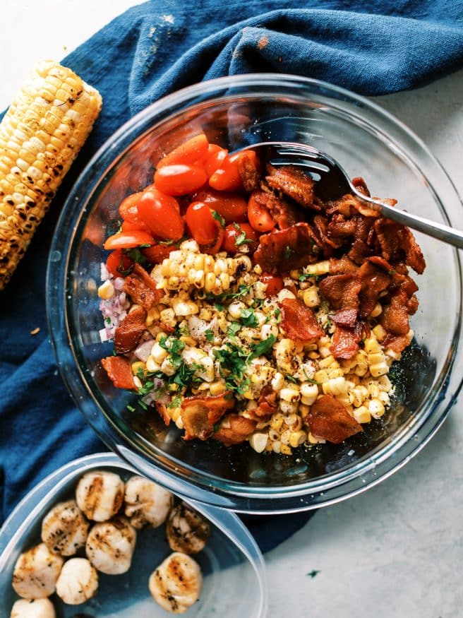 Bacon corn tomato salad with grilled scallops is a light and easy recipe to make for lunch or dinner. Its zesty, fresh, and full of flavor! 