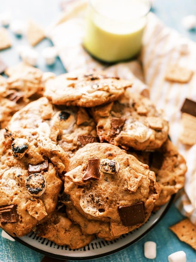 These smoked s'mores cookies are next level. They're s'mores combined with a chocolate chip cookie on a pellet grill to get a beautiful smokey flavor! 