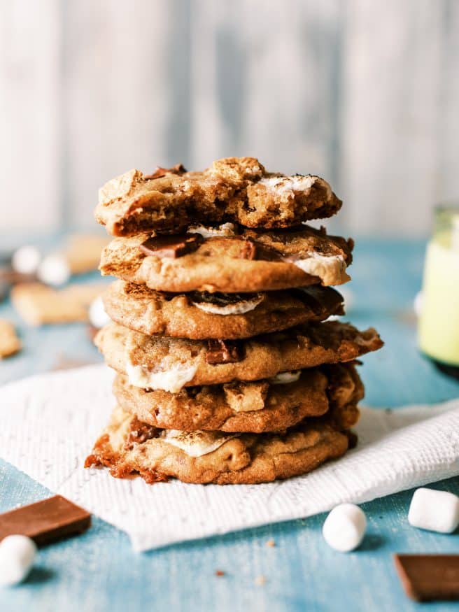 These smoked s'mores cookies are next level. They're s'mores combined with a chocolate chip cookie on a pellet grill to get a beautiful smokey flavor! 