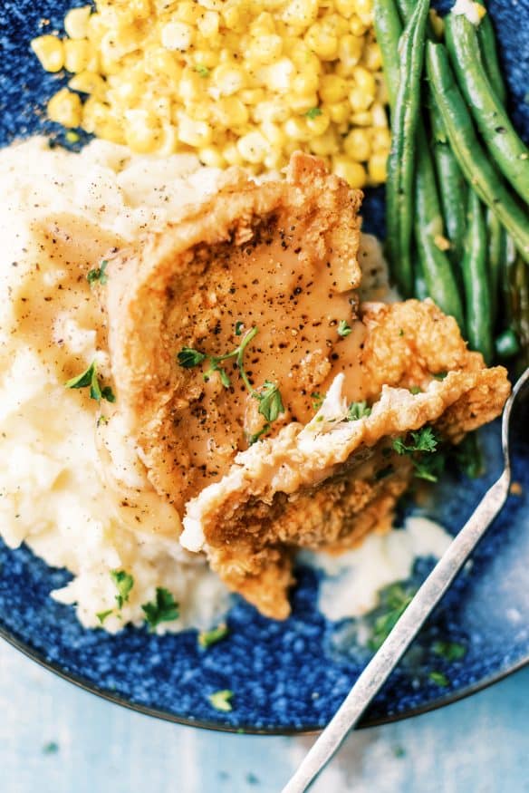 country fried chicken in a seasoned breading that is perfect for a homestyle comfort meal. Thin chicken fried until crispy and golden!