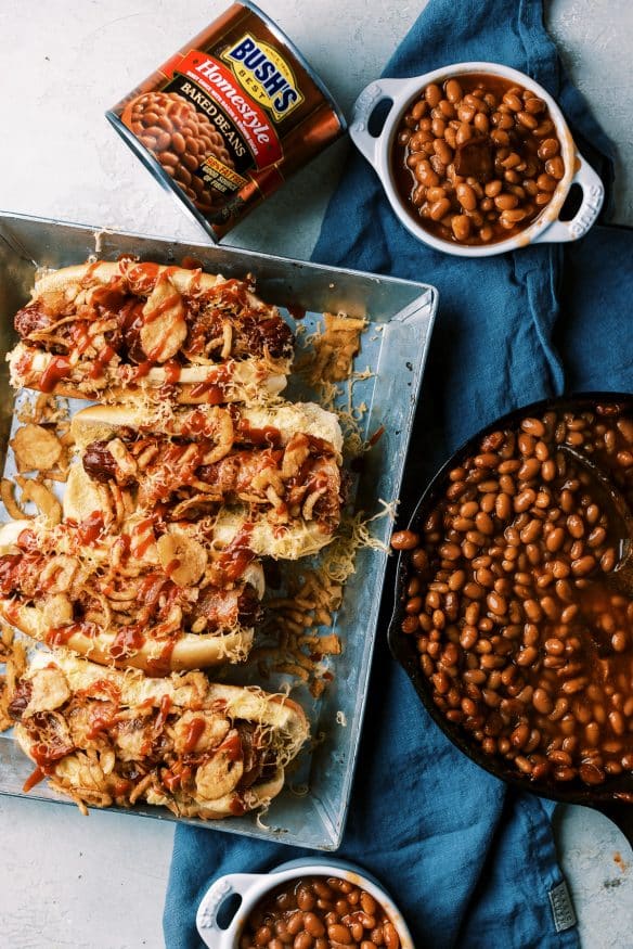 Bacon Wrapped Cowboy Hot dogs with BBQ sauce cheese and some fried onions