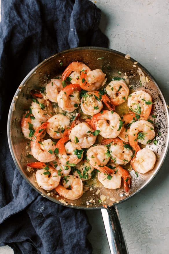 Shrimp Scampi in a oil butter garlic and parsley base with some wine lemon juice and a little crushed red pepper and you're taking it to a whole new level