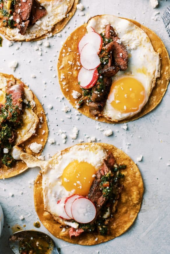 Steak and Egg Breakfast Tacos topped with some chimichurri and a little queso fresco and you've got a amazing twist on a breakfast classic!