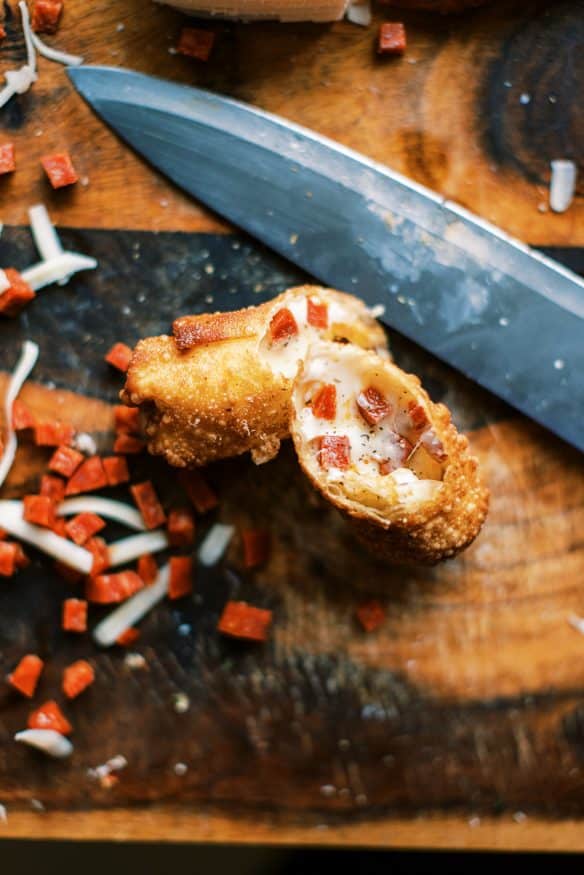 Pepperoni Pizza Egg rolls are exactly what they sound like. Peperoni, mozzarella and some Italian seasonings wrapped in an egg roll, then fried. 