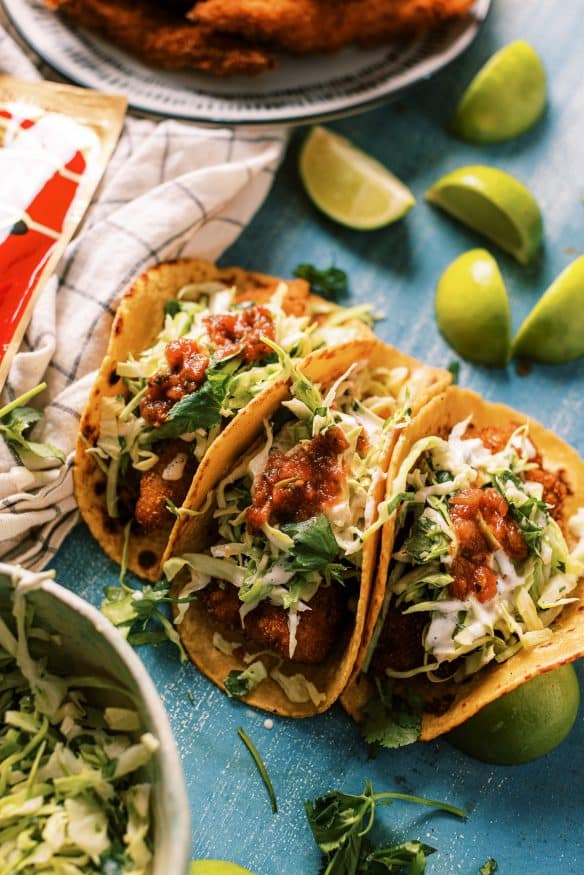 Instant Mashed Potato Crusted Fish Tacos are a must try! Using instant mashed potatoes as a breading for fish tacos, then fried to come out for a super crispy on the outside, tender and flakey on the inside! 