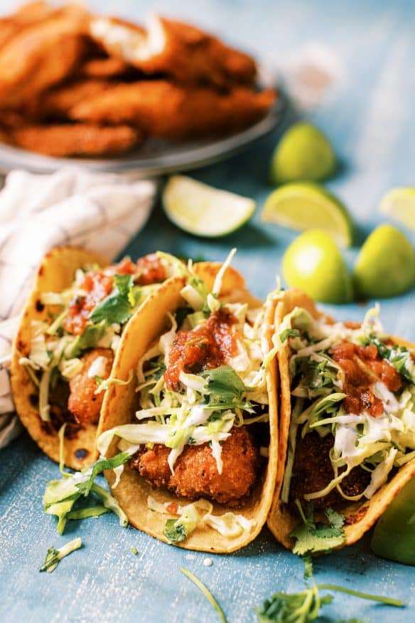 Instant Mashed Potato Crusted Fish Tacos are a must try! Using instant mashed potatoes as a breading for fish tacos, then fried to come out for a super crispy on the outside, tender and flakey on the inside! 